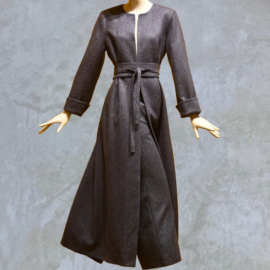 Fitted and Flared Tailored Coat in Blue Herringbone Tweed. Denim-blue in colour with delicate patterning this is a sophisticated textile which flatters the pattern. Perfect for racing and winter events. Handmade in Britain. Front View.