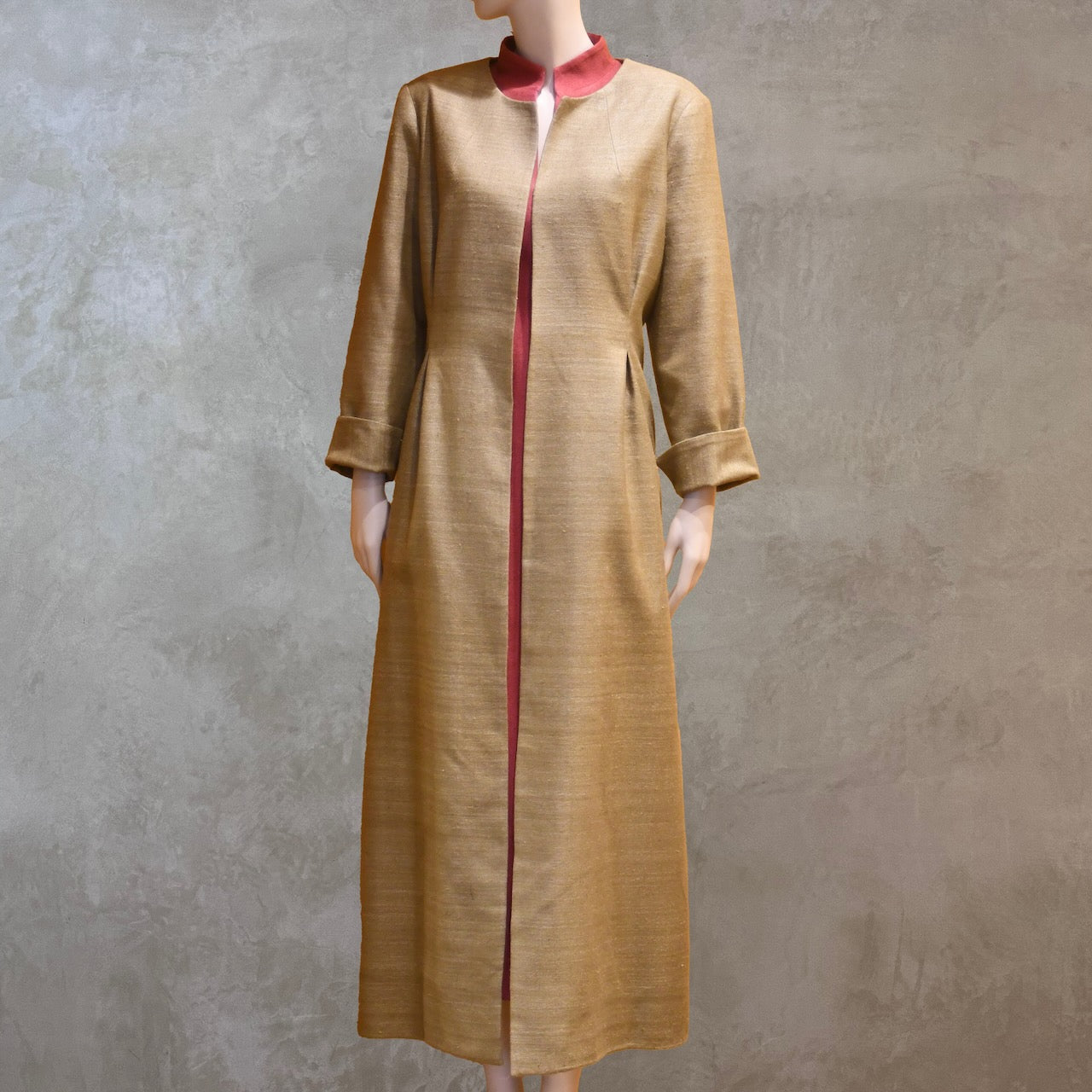 Full shot of Pure Silk formal summer coat in size 18. With a nipped in waist detail this coat is superbly elegant and perfect for wearing at formal spring-summer occasions. Handmade in London and lined in pure silk.