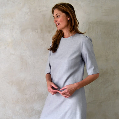 Bespoke A-Line Midi Sleeve Dress in light blue Silk Matka. , Elbow Length Sleeves with puff detail at shoulder. Calf Length (or as required). Handmade in Britain.