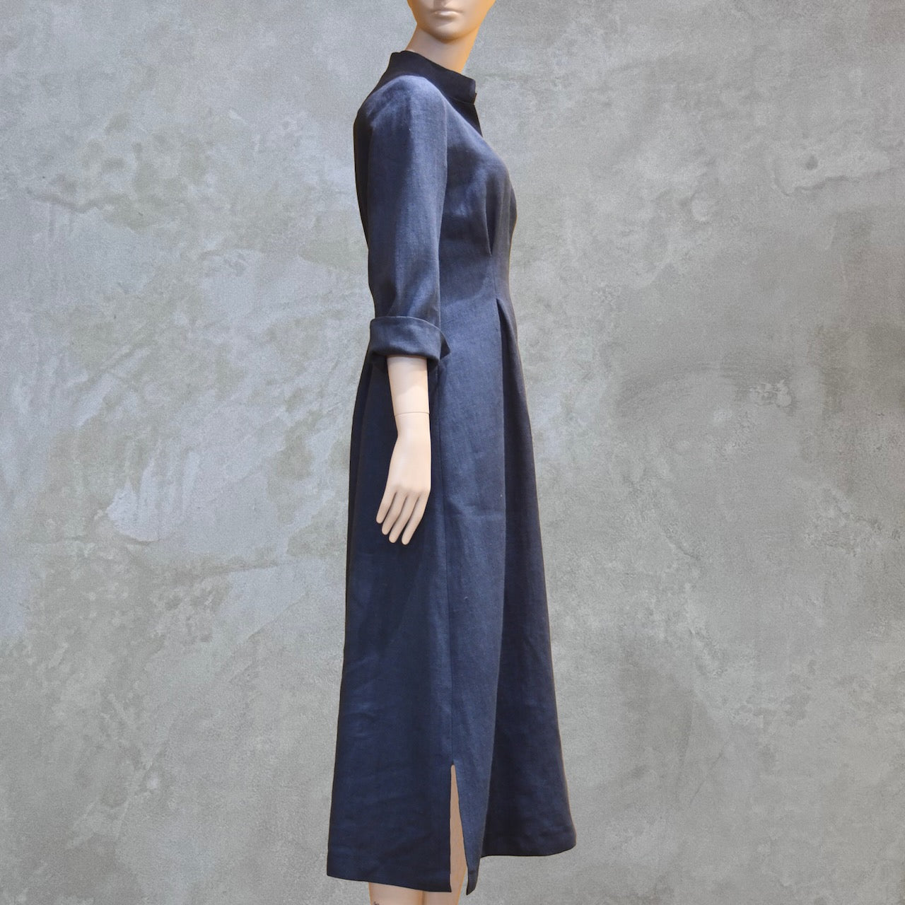 Bespoke Waisted Linen Dress with  Nehru Collar and V-Neck Front, Darted pleats to the front and three Quarter Length Sleeves.
Pure Irish Linen.
Handmade in London
Entirely Made in the British Isles.

