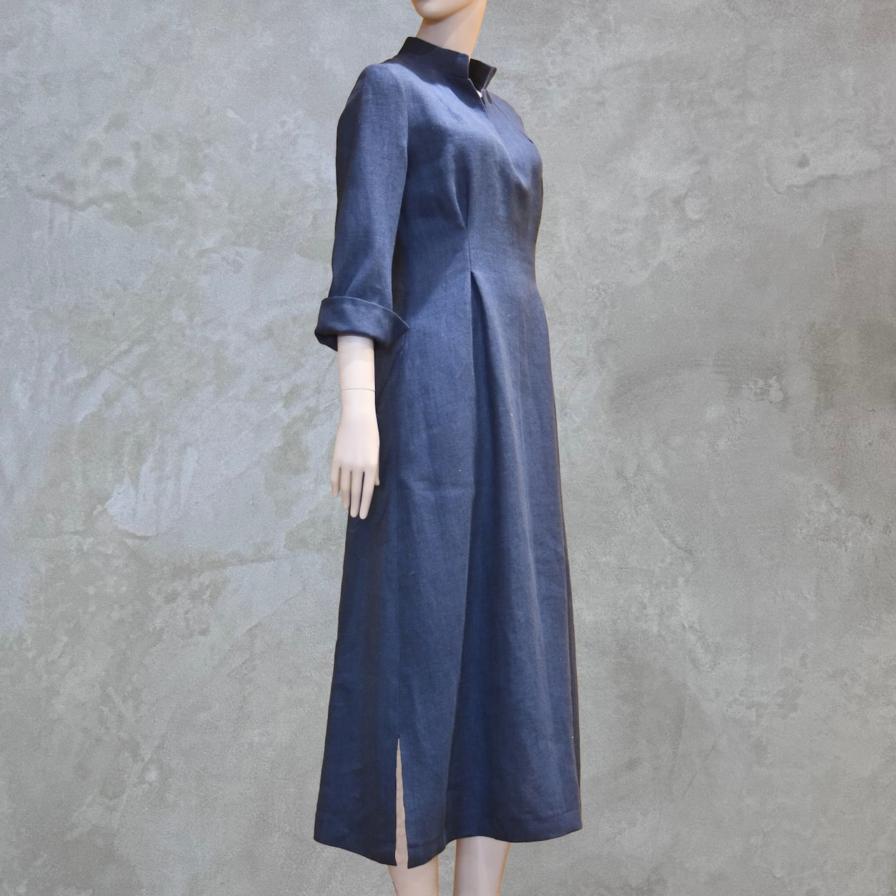 Bespoke Waisted Linen Dress with  Nehru Collar and V-Neck Front, Darted pleats to the front and three Quarter Length Sleeves.
Pure Irish Linen.
Handmade in London
Entirely Made in the British Isles.
