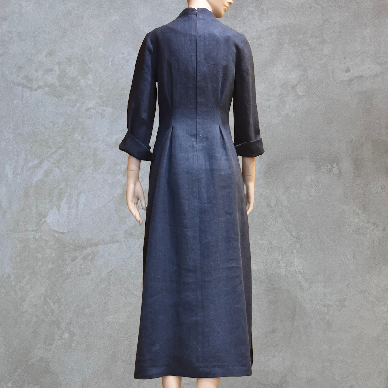Bespoke Waisted Linen Dress with  Nehru Collar and V-Neck Front, Darted pleats to the front and three Quarter Length Sleeves.
Pure Irish Linen.
Handmade in London
Entirely Made in the British Isles.

