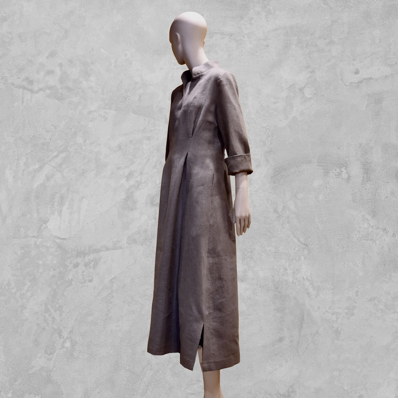 Bespoke Waisted Linen Dress with  Nehru Collar and V-Neck Front, Darted pleats to the front and three Quarter Length Sleeves.
Pure Irish Linen.
Handmade in London
Entirely Made in the British Isles.
