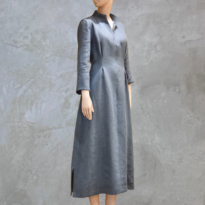 Bespoke Waisted Linen Dress with  Nehru Collar and V-Neck Front, Darted pleats to the front and three Quarter Length Sleeves.
Pure Irish Linen.
Handmade in London
Entirely Made in the British Isles.
