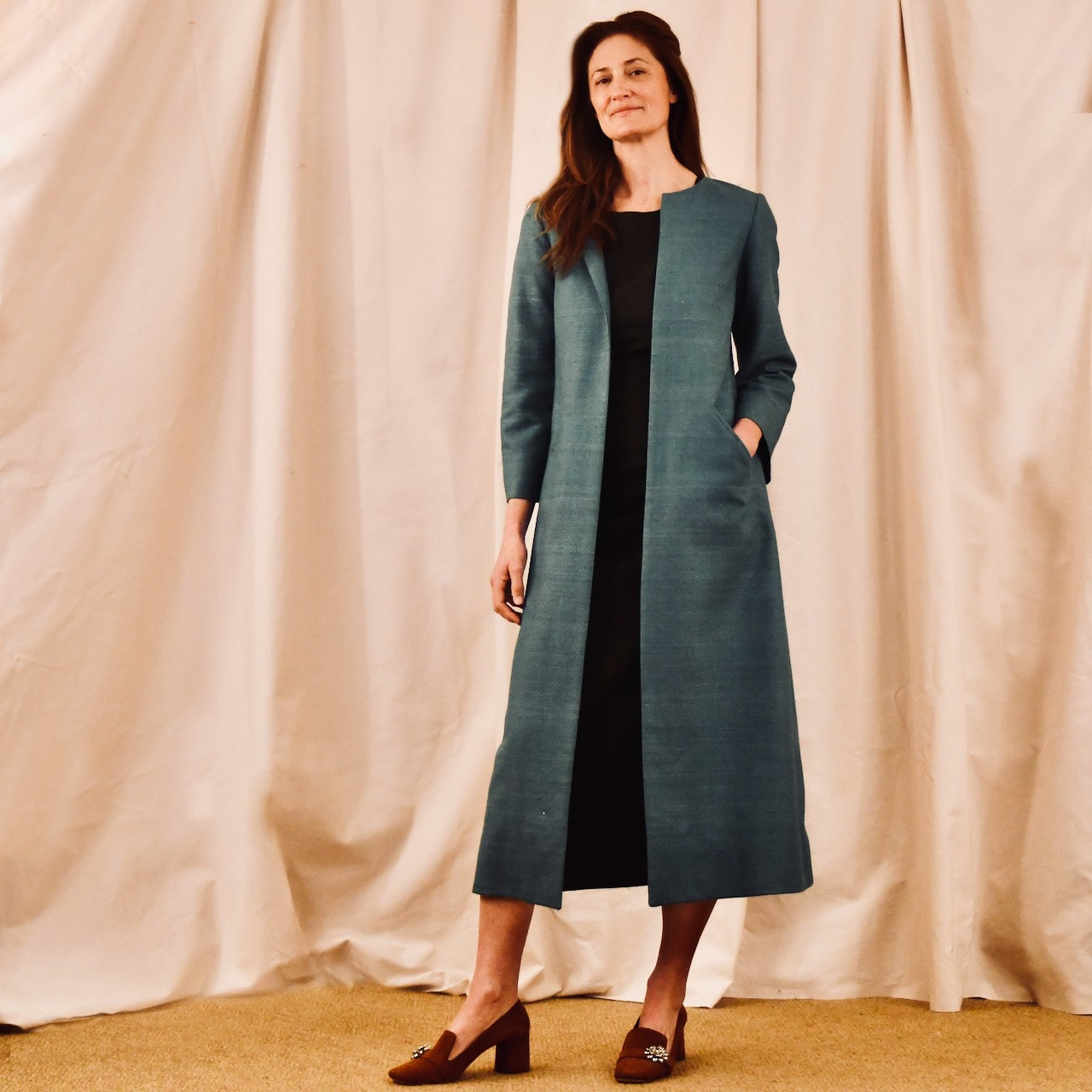 EdNerat Silk Matka A-Line Coat in emerald green. Handmade in Britain. 