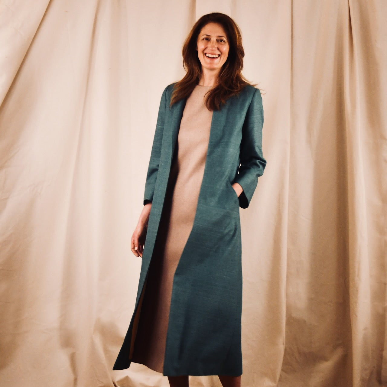 EdNerat Silk Matka A-Line Coat in emerald green. Handmade in Britain. 