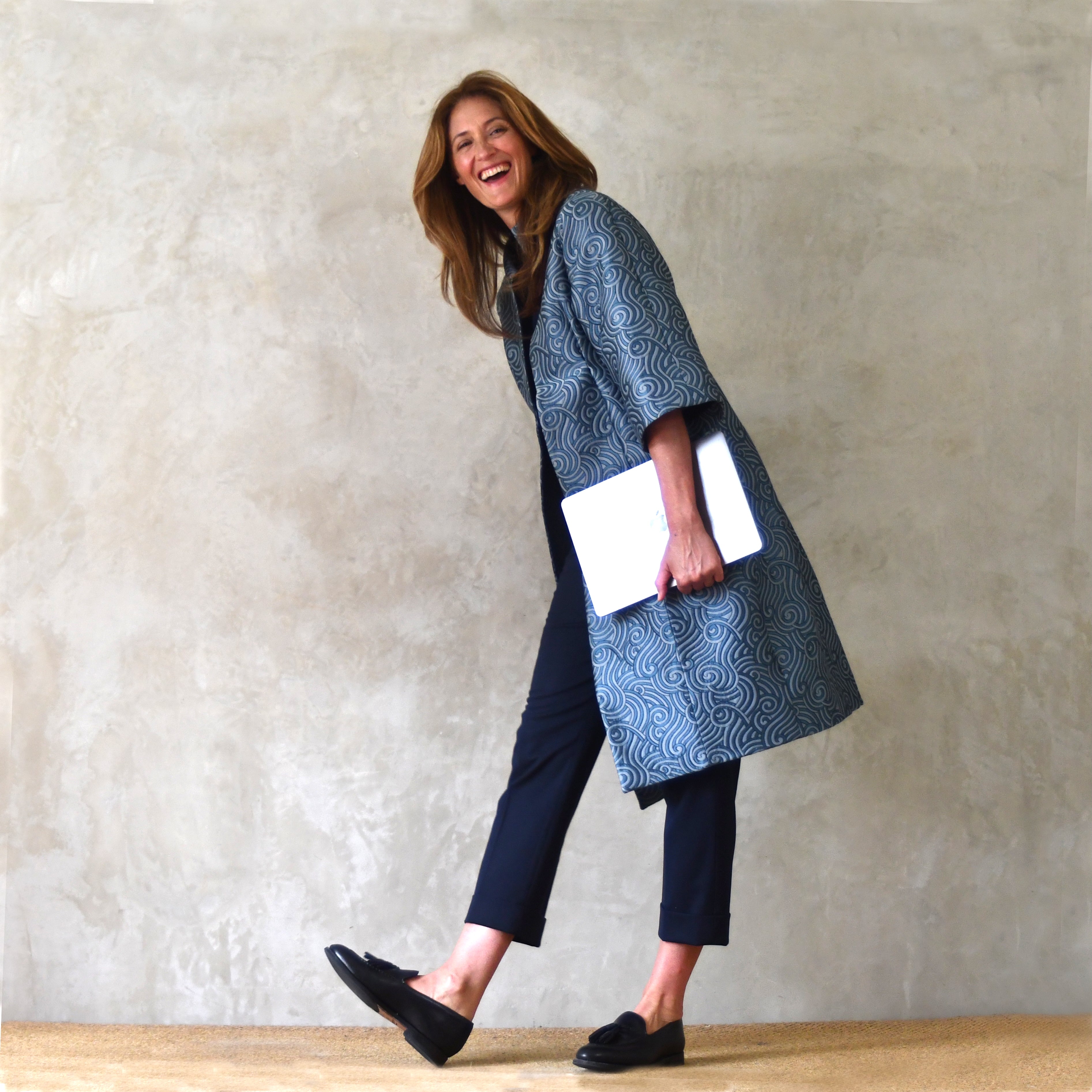 Cocoon Coat in a Teal Silk Mix Brocade
A magnificent and hugely versatile mid length cocoon in a richly patterned limited edition brocade from Stephen Walters. Walking View.