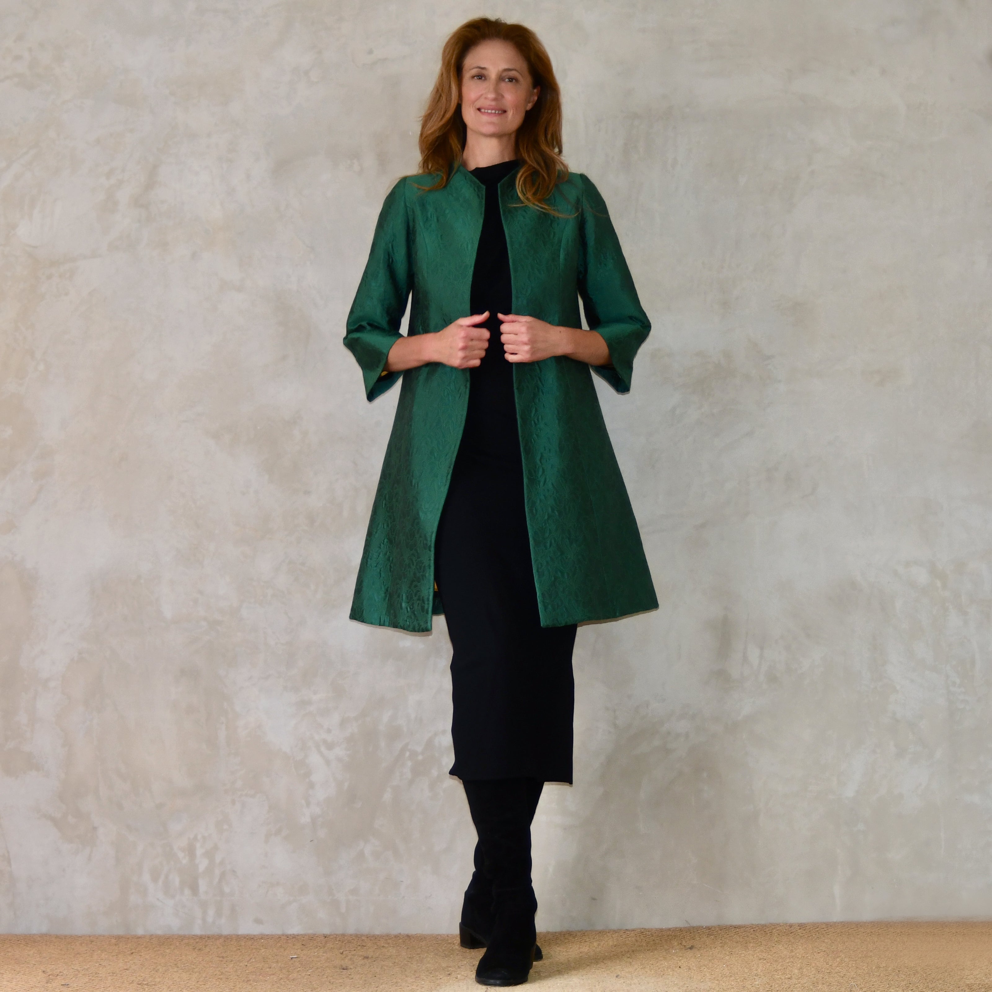 Swing Trapeze Coat in Emerald Brocade. An elegant and easy coat with a self-patterned flower motif and a luxurious sheen. Handmade in Britain.