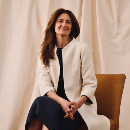 Trapeze Swing Coat in White Silk Boucle
White MidLength Swing Coat with slight vintage feel and flattering seaming details to front and rear. The perfect transitional piece - smart enough for the best occasions, easy enough to wear every day. Handmade in Great Britain. Relaxed Seated View.