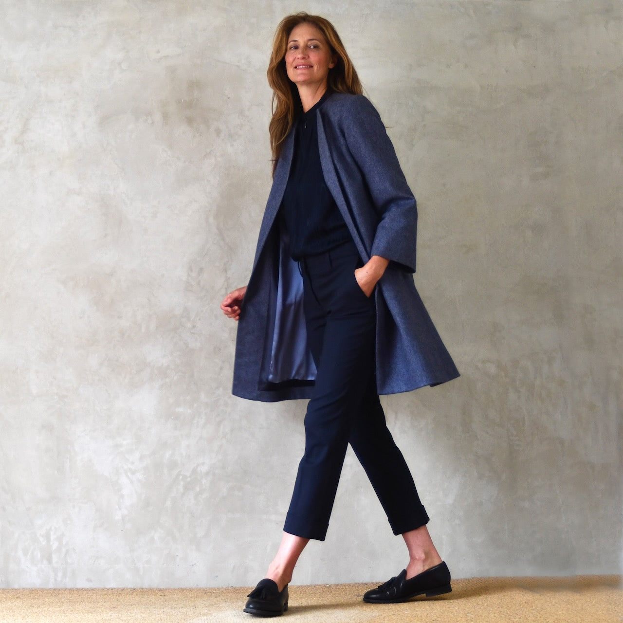 Swing Coat in Herringbone Lambswool Tweed. A Bespoke Yorkshire Tweed coat in a luxurious wool Fabric. Handmade in Britain.