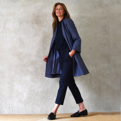 Swing Coat in Herringbone Lambswool Tweed. A Bespoke Yorkshire Tweed coat in a luxurious wool Fabric. Handmade in Britain.