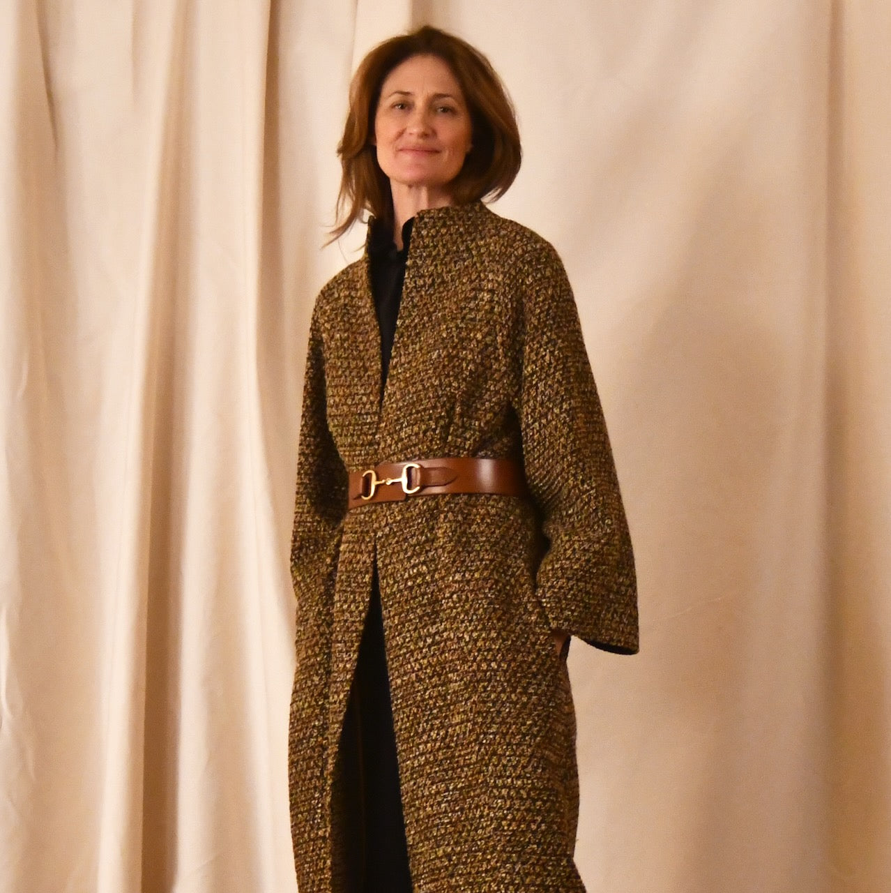 Longer Length Cocoon Coat in Golden Linton Tweeds Boucle. A dramatic, but incredibly wearable cocoon coat in a truly splendid boucle that will carry you well through Autumn and Spring. Handmade in Britain. Belted View.