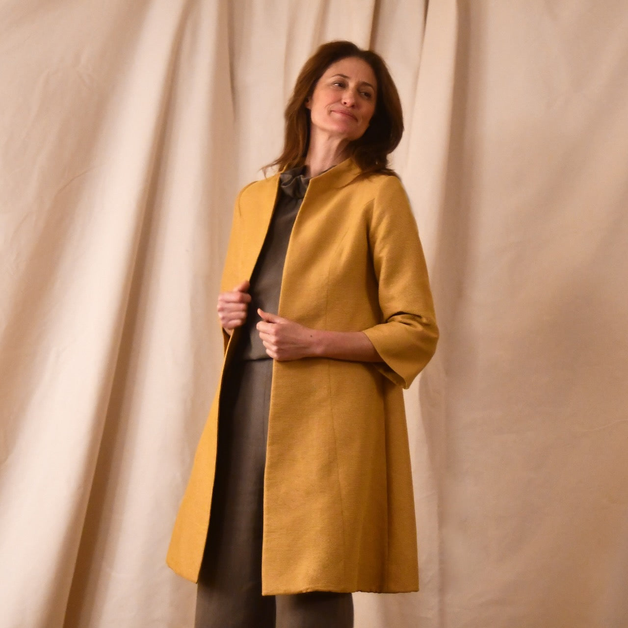 Trapeze Swing Coat in Golden Yellow Brocade from Stephen Walters. Handmade in Britain.
