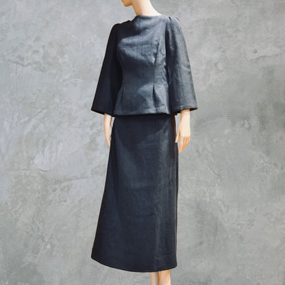 Front Side view of bespoke Navy Tailored Linen Skirt Suit showing boatneck peplum shaped cop over longer length A-Line Skirt. Cut, Made and Finished by Hand n London, bespoke lengths and sizes are also available.