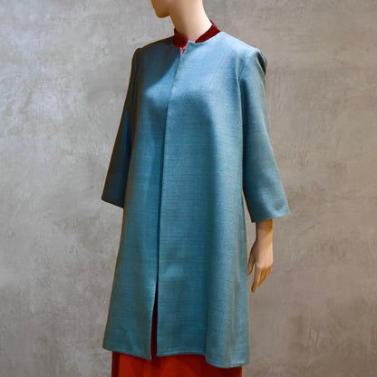 Front View of Emerald Green silk car coat. A Perfect summer weight coat - ideal for weddings, work and more. Hand made in London. Lined in pure silk.