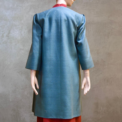 Rear view of Emerald Green silk car coat. A Perfect summer weight coat - ideal for weddings, work and more. Hand made in London. Lined in pure silk.