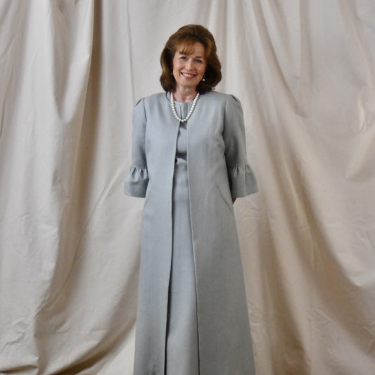 Bespoke Bell Sleeve A Line Occasion Coat in Pale Blue Silk Matka. Fully lined in Silk. Handmade in Britain. Front View Close.