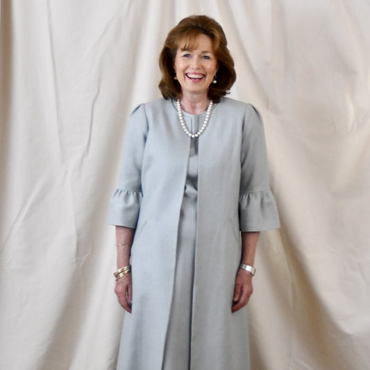 Bespoke Bell Sleeve A Line Occasion Coat in Pale Blue Silk Matka. Fully lined in Silk. Handmade in Britain. Front Close Up.