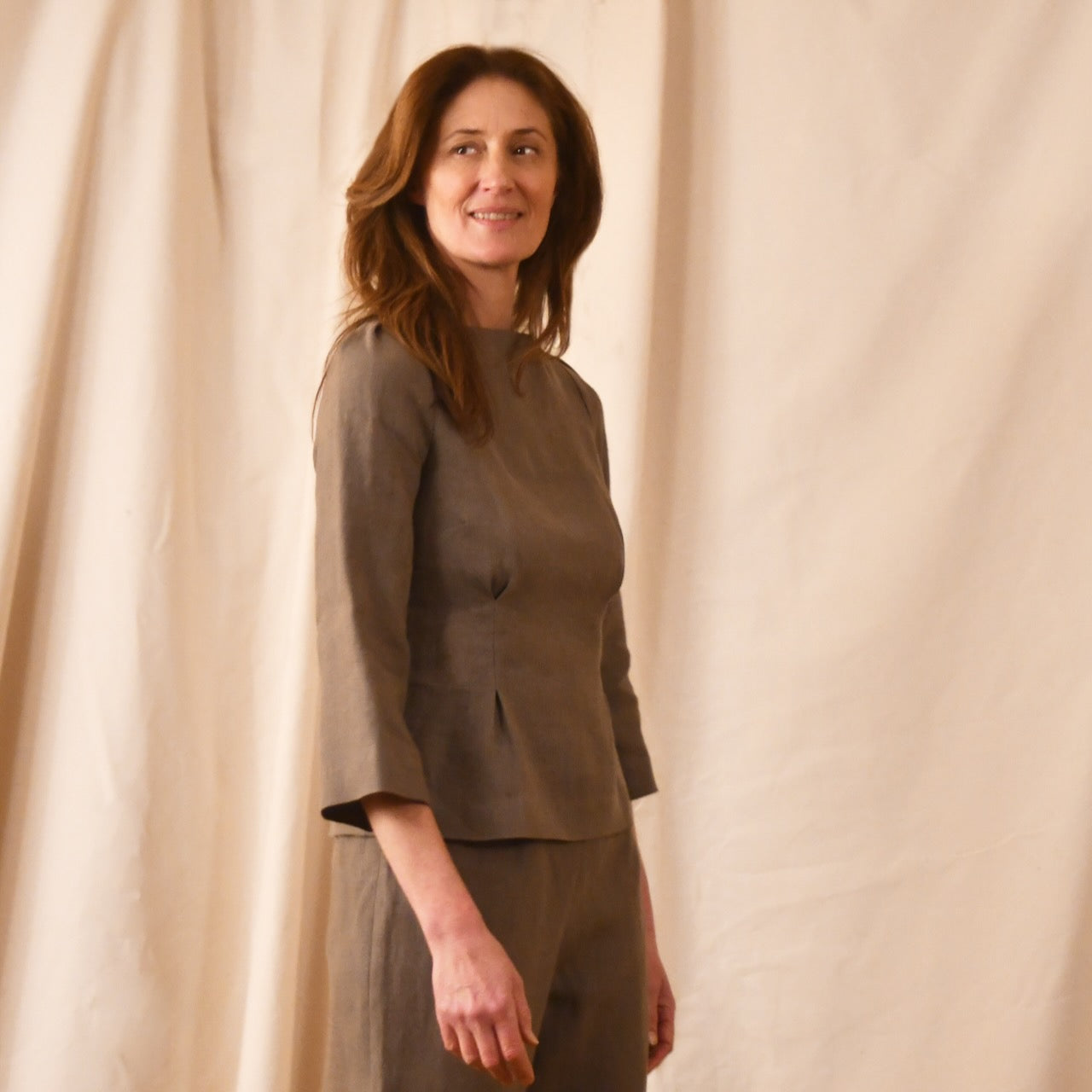 Bespoke Tailored Irish Linen separates featuring a Tailored Boat Neck Blouse in brown linen with matching pants. Handmade in Britain. Top Close up