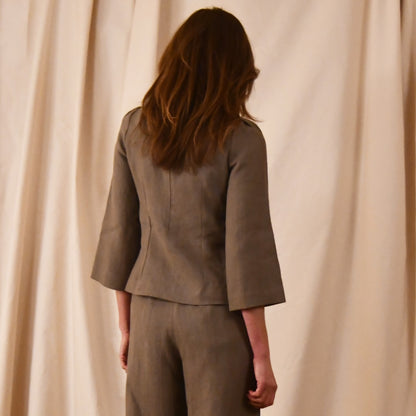 Bespoke Tailored Irish Linen separates featuring a Tailored Boat Neck Blouse in brown linen with matching pants. Handmade in Britain.  Rear View.