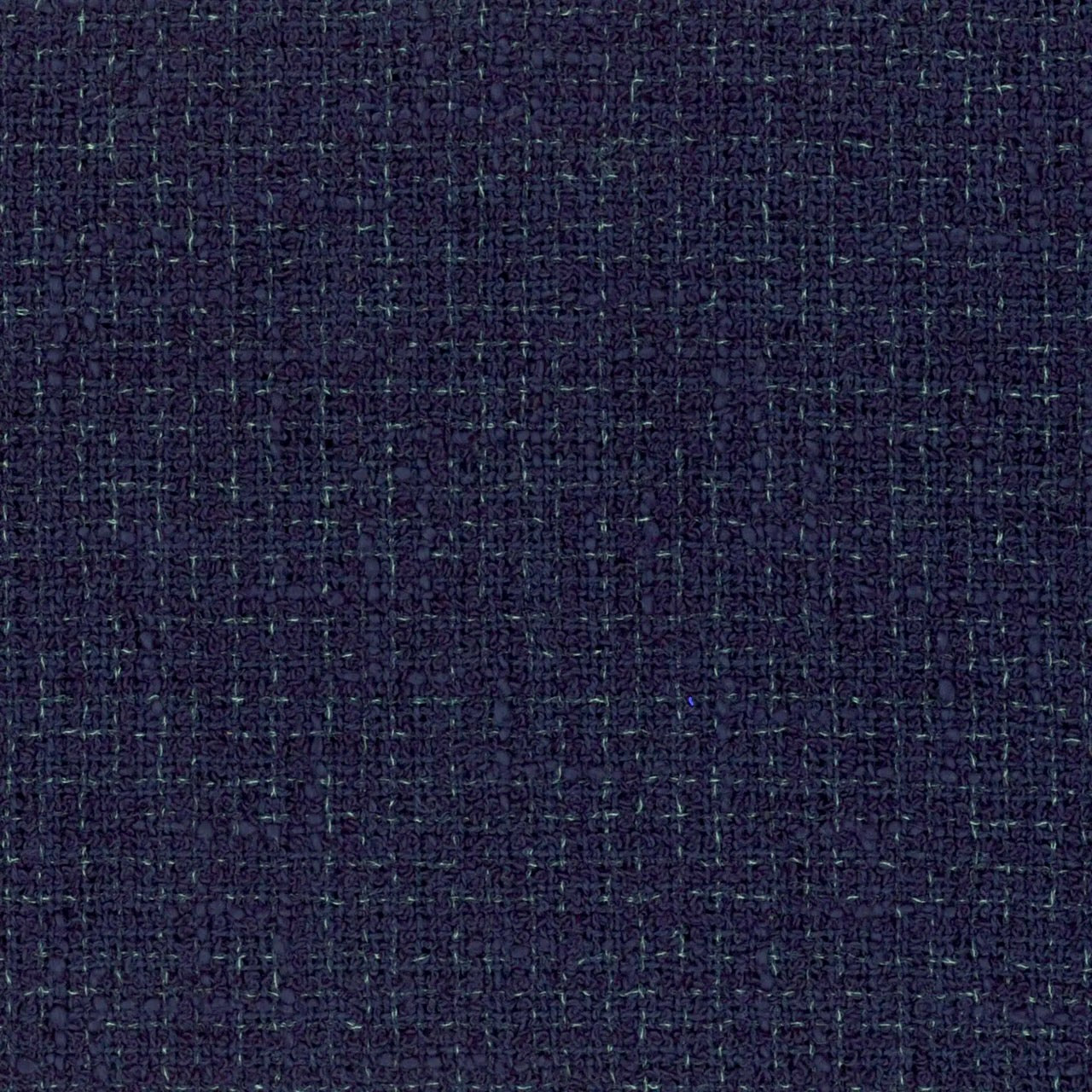 A Bespoke Bell Sleeved A Line Coat in Navy, Black and White Cotton Boucle from Linton Tweeds. A minimalist but elegant summer coat with three-quarter bell sleeves and an A-Line design. Fabric Detail. Handmade in Britain. 