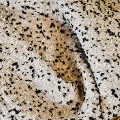 A tailored skirt suit in a light coloured Linton Tweeds bouclé – perfect for Royal Ascot and other formal occasions in spring and summer. Handmade in Britain. Fabric Close Up