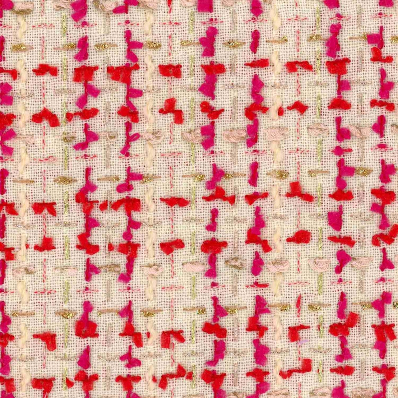 A close-up of bespoke woven fabric with a beige background, featuring irregular vertical lines in bright pink, red, and hints of olive green for a textured and colorful pattern.