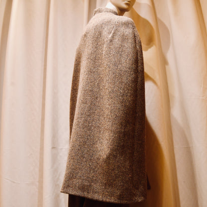 Cape in Small Brown Check Lovat Tweed, featuring a collar. Handmade in Britain.