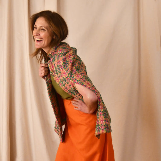 The Clayton Cape in Multicoloured Linton Tweeds Bouclé. A shorter length, easy to wear cape for dressing up or down, mid-season and summer wear. Handmade in Britain.