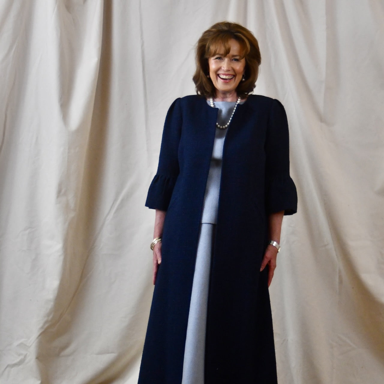 Longer Length Bell Sleeve A Line Coat in Navy Cotton Boucle from Linton Tweeds. Handmade in Britain.