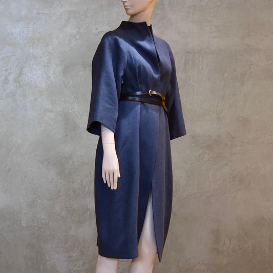 Shorter length cocoon coat in pure irish linen. Handmade in London this coat is lined in silk, has generous shaping and can be belted at the waist.