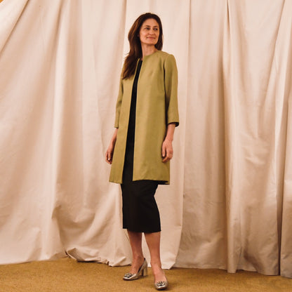 Bespoke Trapeze Coat in Silk Matka. This is a Summer Weight Silk Car Coat style shorter length coat which is available to order in a host of colours. Handmade in Great Britain. Side view.
