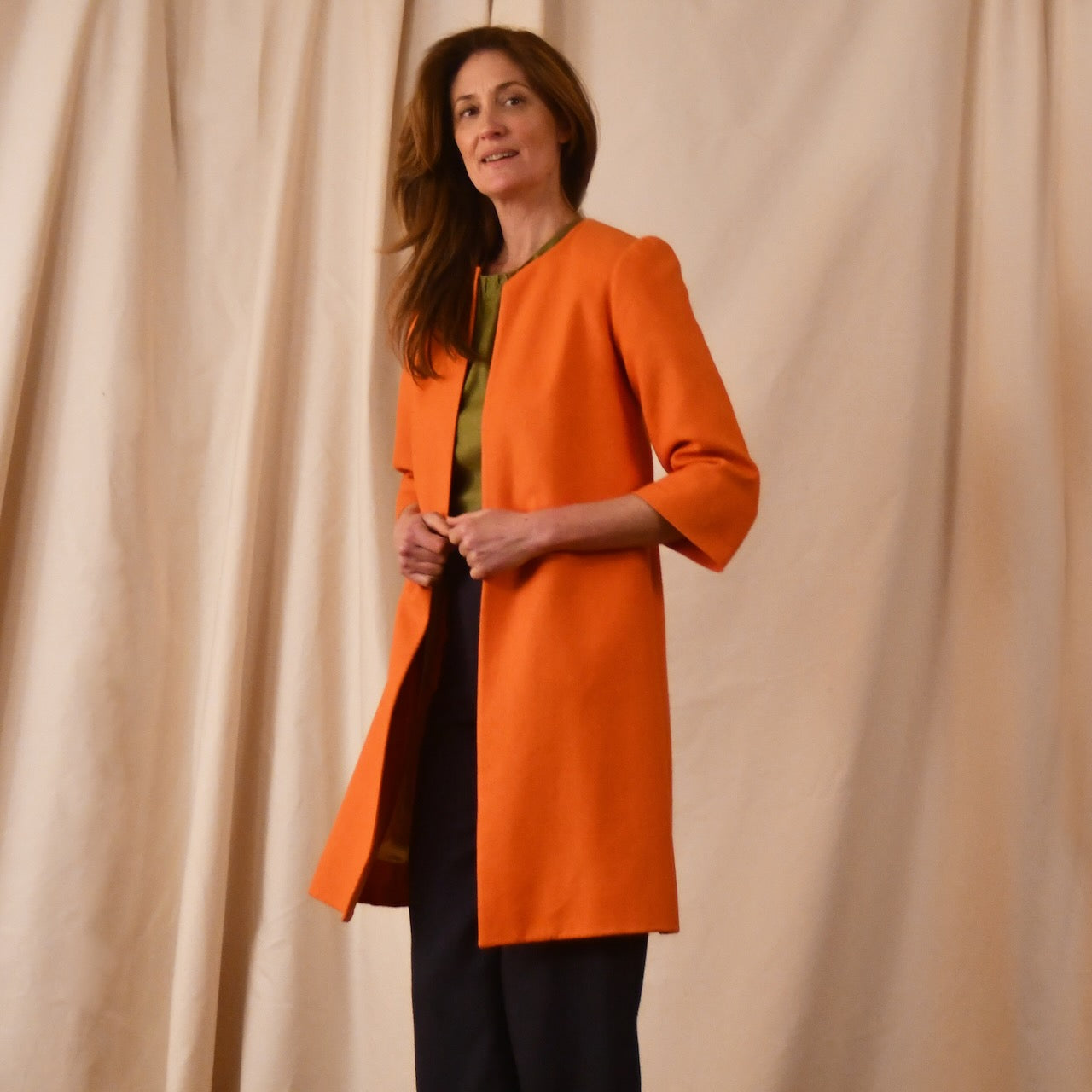 Bespoke Shoulder Detail Trapeze Coat in Silk Matka. This is a Summer Weight Silk Car Coat style shorter length coat available to order in a host of colours. Handmade in Great Britain. Side View.