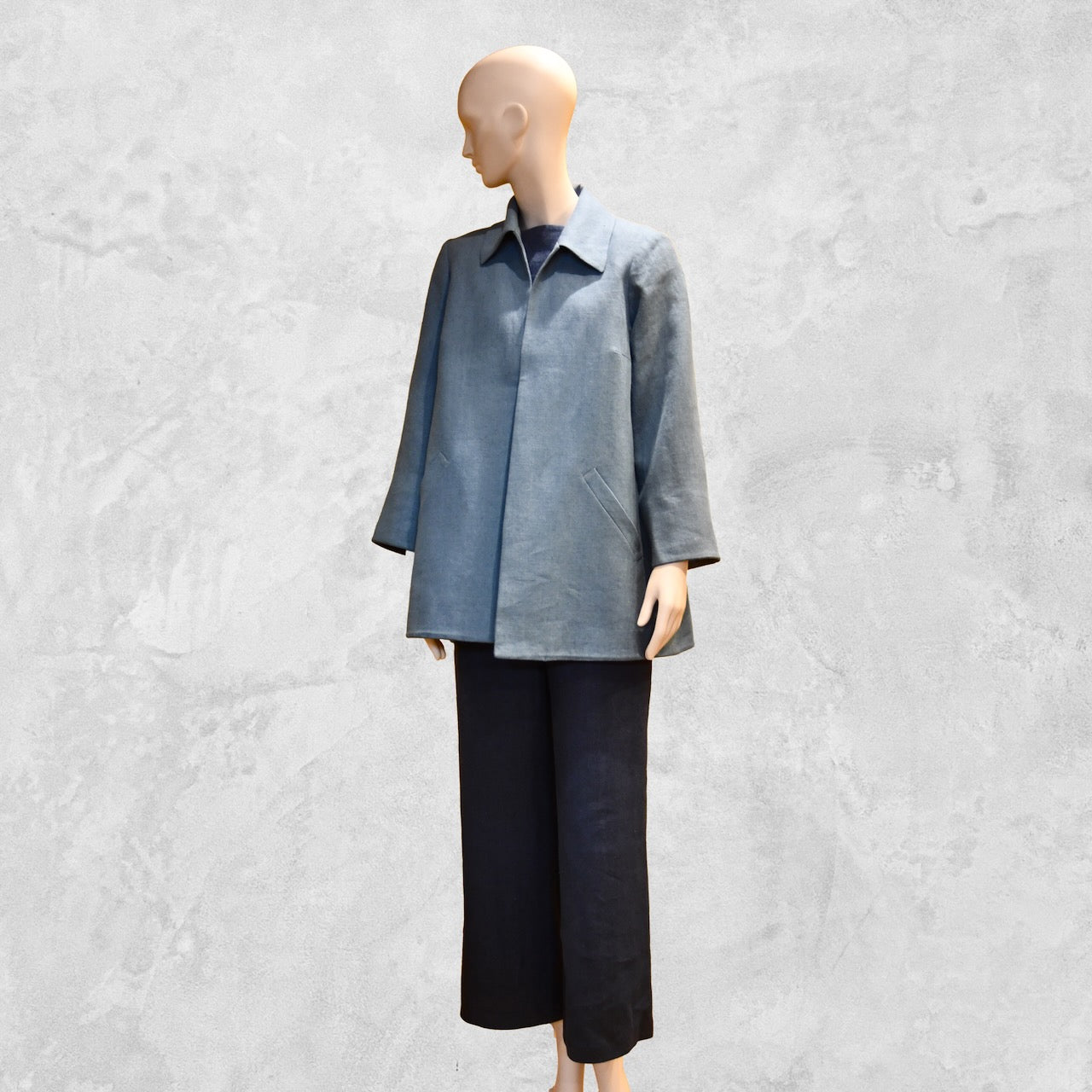 Light Blue Swing Jacket in Irish Linen. Easy and elegant jacket with cuff detail, slant pockets and a wide neck. Handmade in Britain. Full View.