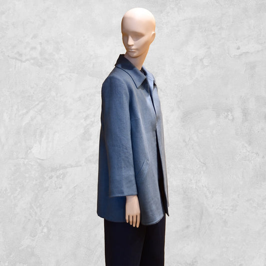 Light Blue Swing Jacket in Irish Linen. Easy and elegant jacket with cuff detail, slant pockets and a wide neck. Handmade in Britain. Side View.