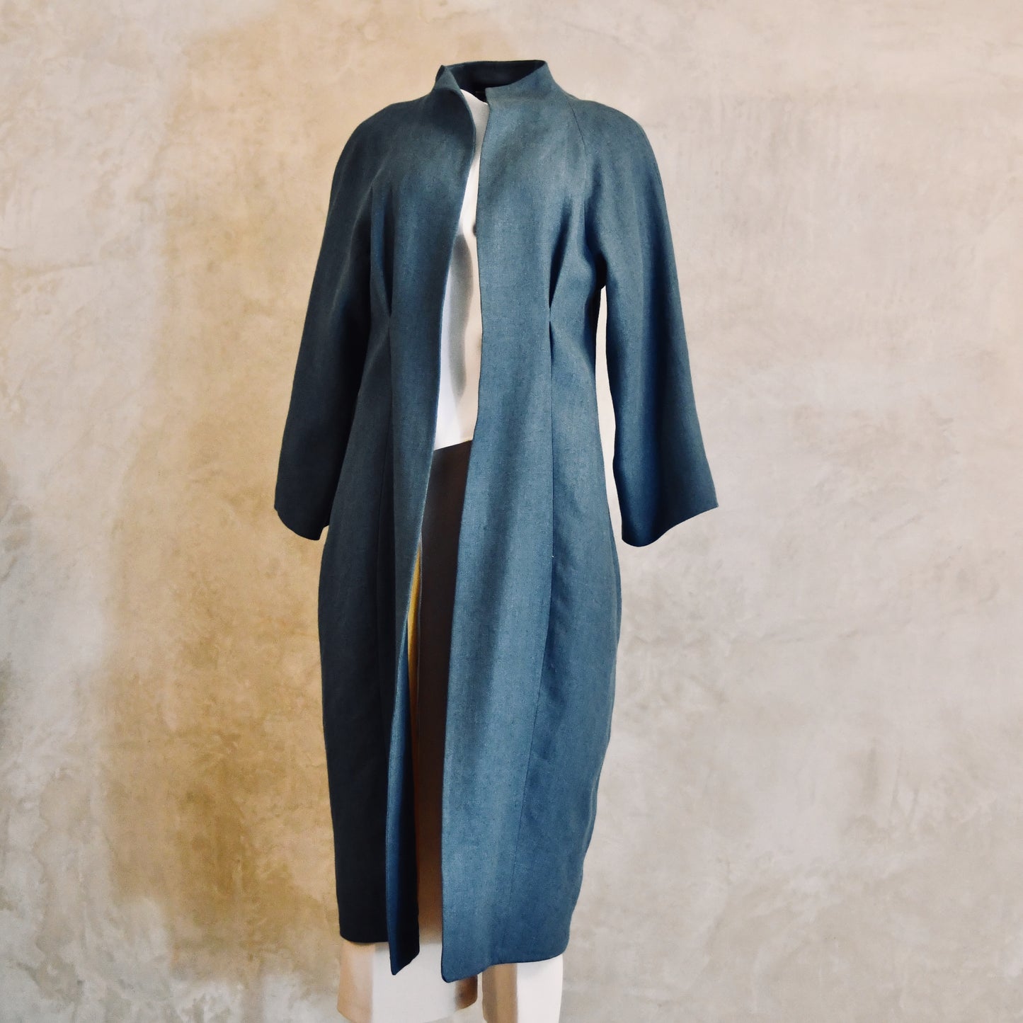 Long Cocoon Coat in Teal Irish Linen is a long, open-front coat with long sleeves. Perfect for a relaxed look. Handmade in Britain.