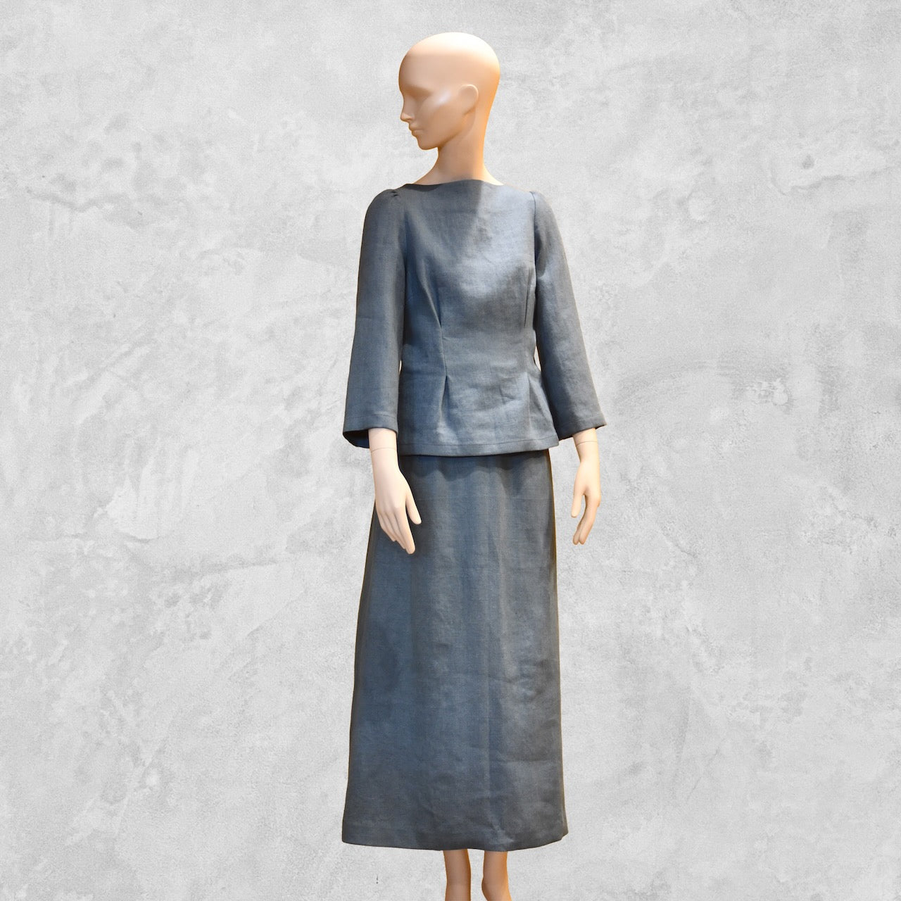 Besopke Summer Skirt Suit in Irish Linen. A Tailored Linen top paired with a n A-Linen Linen skirt. Handmade in Britain.lue Skirt and Top. Side View.