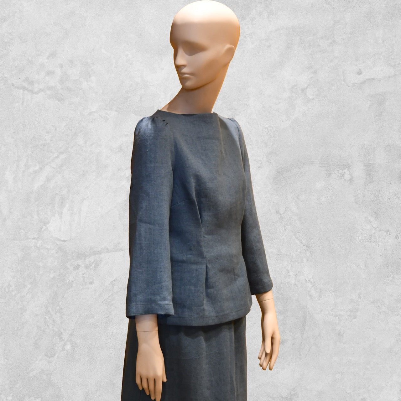 Besopke Summer Skirt Suit in Irish Linen. A Tailored Linen top paired with a n A-Linen Linen skirt. Handmade in Britain.lue Skirt and Top. Close up on Top, taken from Side.