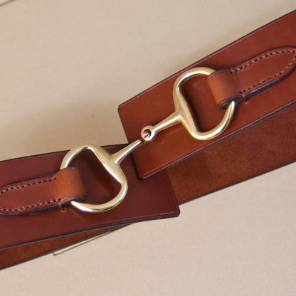 A close-up of the EDNERAT Hazel Adjustable Bit Belt 95-110 cm, featuring an adjustable bit buckle and solid brass fittings. Handmade in Britain.