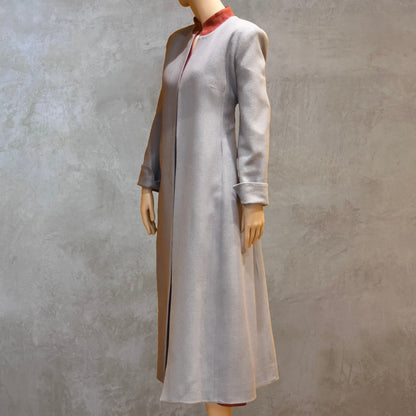 Fitted Coat with nipped in waist executed in a delightful pure silk silk matka weave. Handmade in London this longer length coat is perfect for weddings and formal summer occasions.