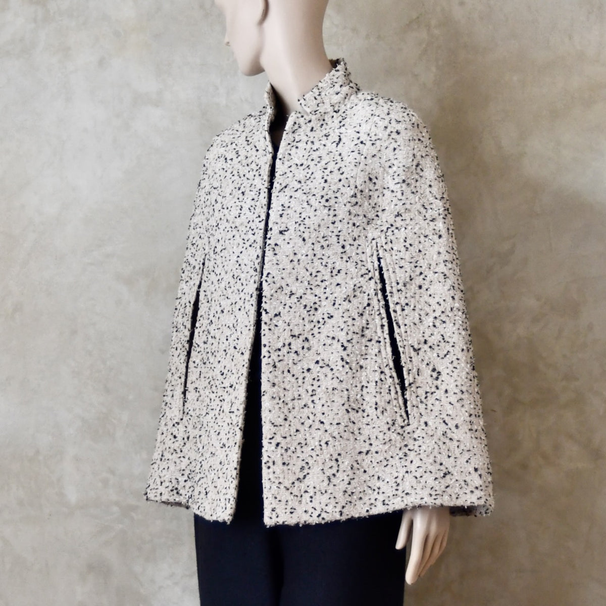 10 – The Clayton Cape in White and Charcoal Boucle