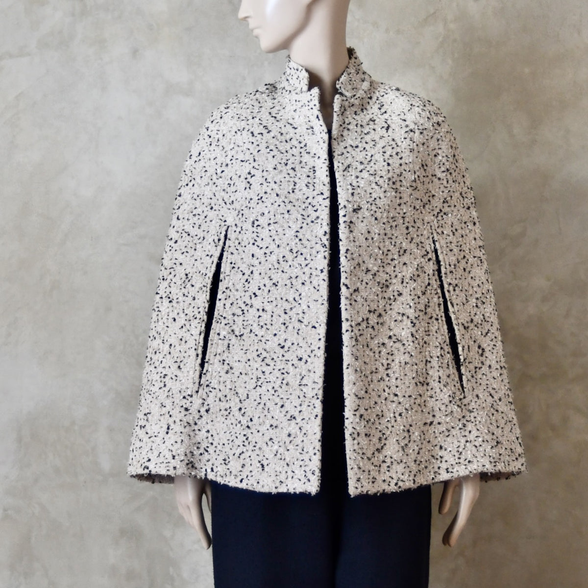 10 – The Clayton Cape in White and Charcoal Boucle