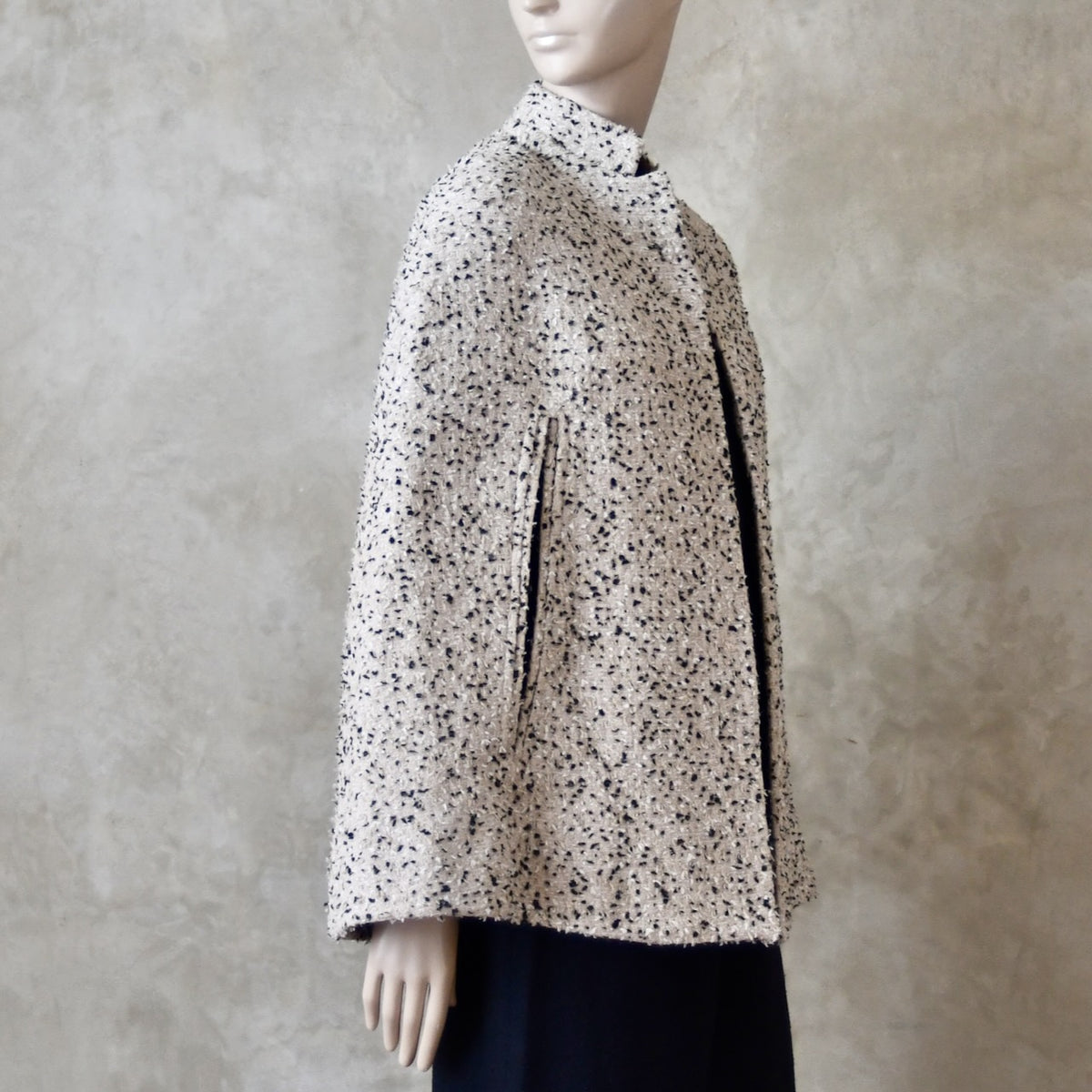 10 – The Clayton Cape in White and Charcoal Boucle
