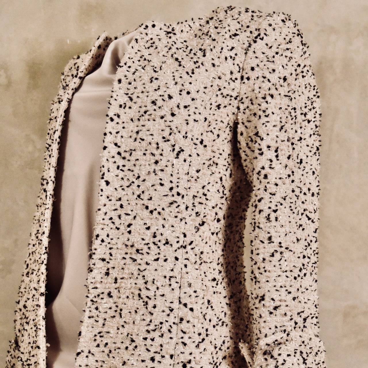 Bespoke Tailored Hourglass-Shaped Coat in Camel, Black and White Flag Textured Bouclé, from Linton Tweeds. A Collar-less shaped coat for weddings and formal occasions. Handmade in Britain.