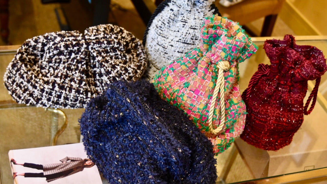 Showing hand made boucle bags. Made from EdNerat cut offs, these Linton Tweeds bags are ideal for occasion wear. Hand Made in Wales. Zero Waste Making.