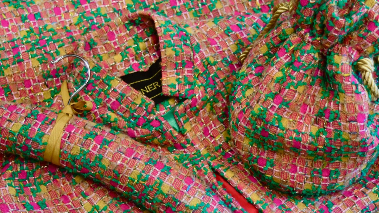 Linton Tweeds Cut offs from EdNerat repurposed into a silk lined cape, padded hanger and drawstring bag. Perfect for occasion wear. Handmade in Wales.
