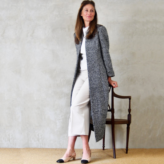 Fitted Longline Hourglass Coat in Linton Tweeds Black and White Boucle. An investment piece for Ascot, Weddings and Work. Handmade in Britain. Standing View.