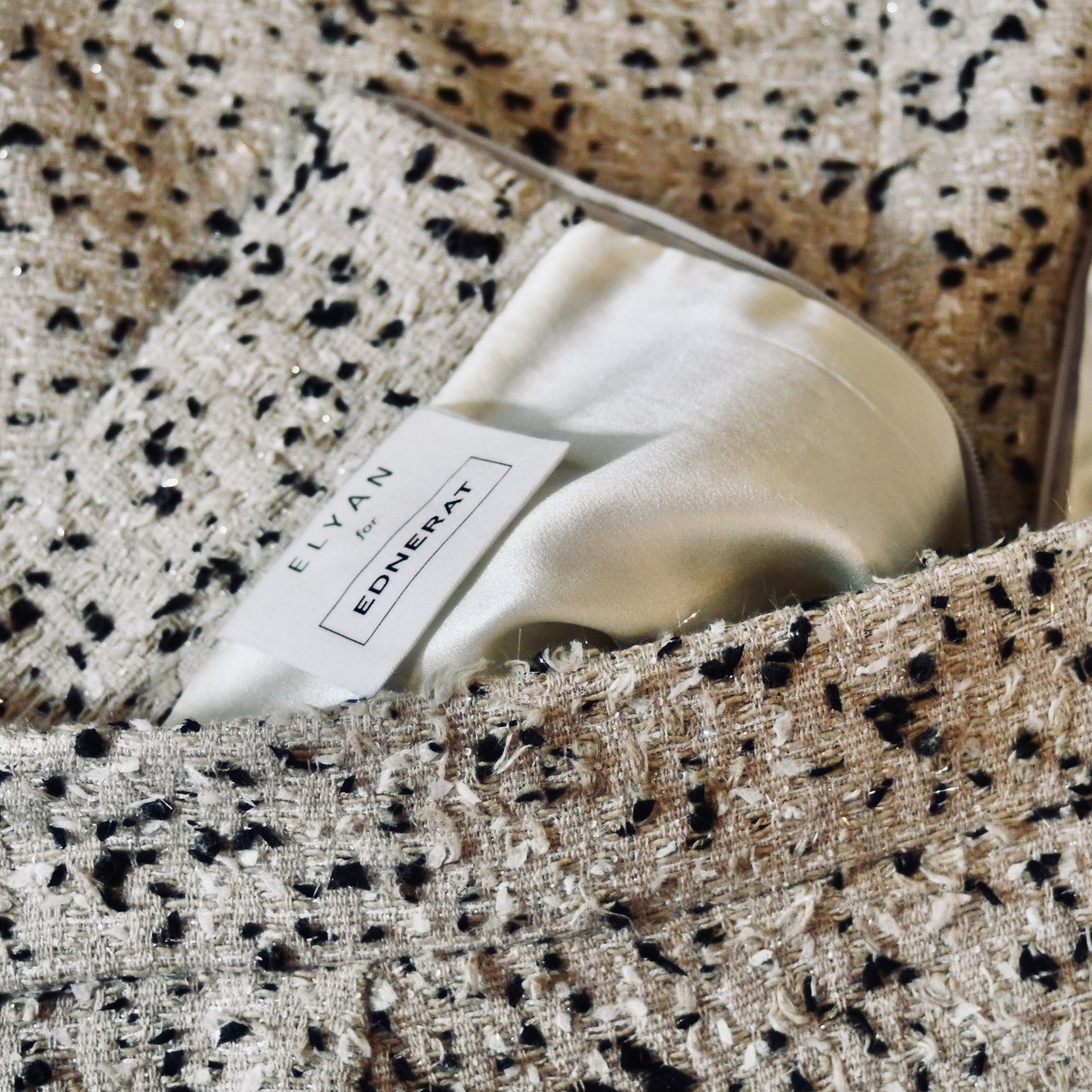 A tailored skirt suit in a light coloured Linton Tweeds bouclé – perfect for Royal Ascot and other formal occasions in spring and summer. Handmade in Britain.  Skirt Lining
