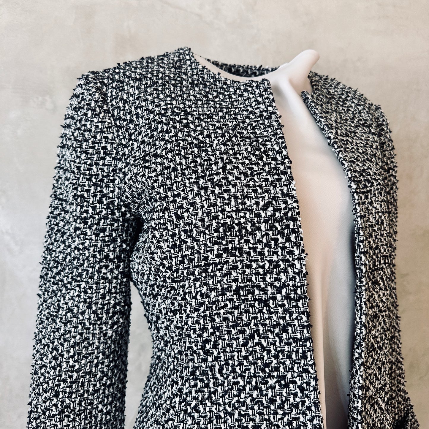 Fitted Longline Hourglass Coat in Linton Tweeds Black and White Boucle. An investment piece for Ascot, Weddings and Work. Handmade in Britain. Collar Detail.